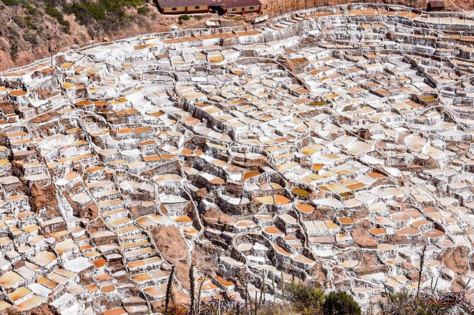 From Cusco: Moray, Maras Salt Mines & Chinchero Weavers Half-Day - Moray terraces: an Inca greenhouse experiment you can walk through