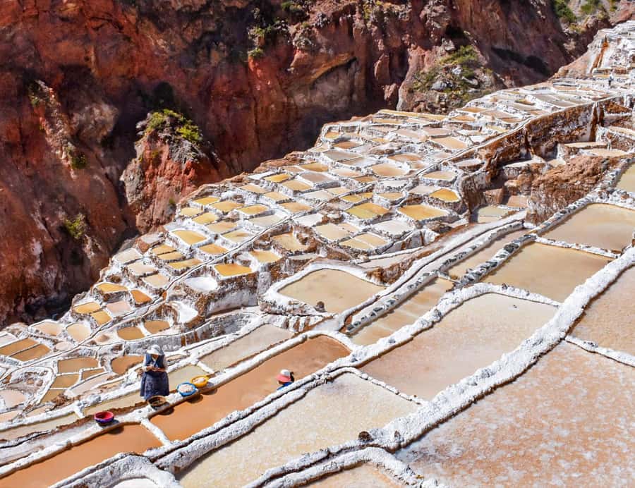 From Cusco: Moray, Maras Salt Mines & Chinchero Weavers Tour - Salineras salt mines: 3,000 pools and a process that still runs