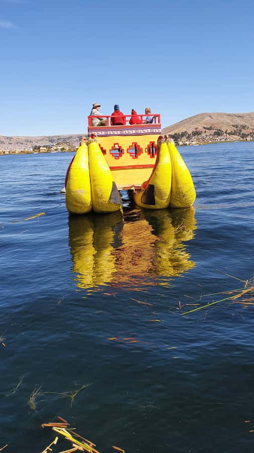From Puno: 3-Hour Uros Floating Islands Tour - Hotel Pickup in Central Puno and the Short Boat Crossing