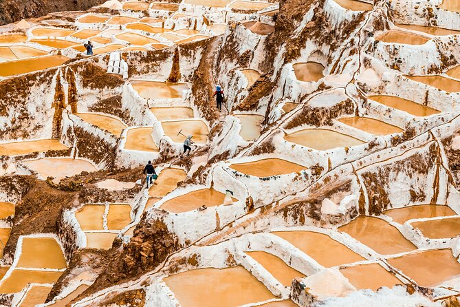 Moray and Maras Salt Mines Full Day Tour - Small Groups - Maras town stop: colonial-style doors and Andean tradition