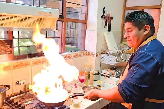 Vegan Peruvian Cooking Class Cocktails and Local Market in Cusco - From market chaos to a calm cooking studio in the center of Cusco